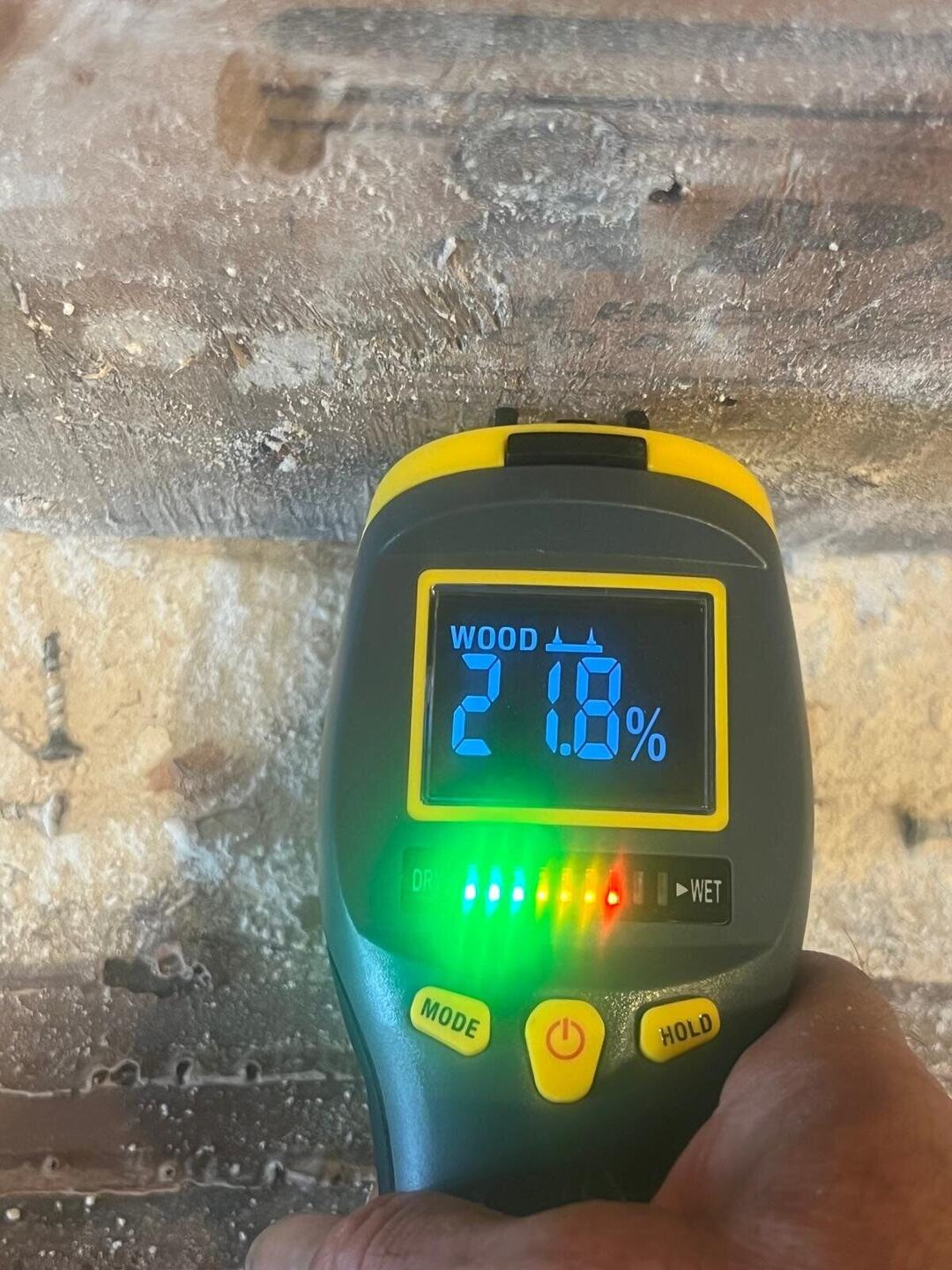 Moisture meter reading wet on the subfloor